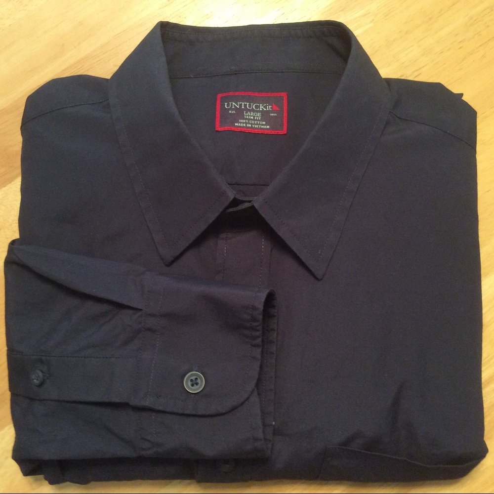 Untuckit  blue button down shirt.  Slim fit L.